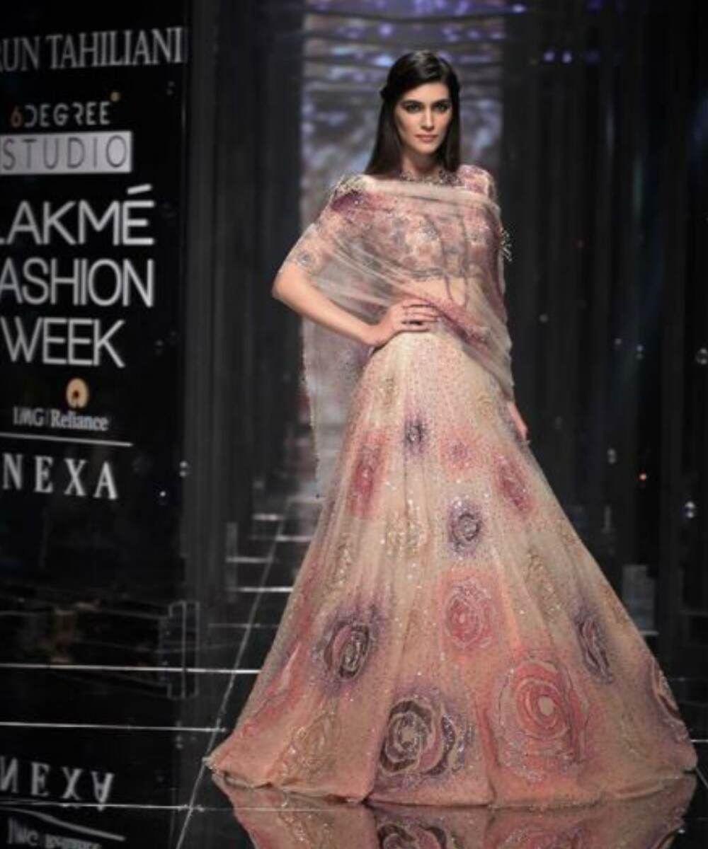 Kriti Sanon wore a floral Indian lehenga from Tarun Tahiliani's collection Kriti Sanon wore a floral Indian lehenga from Tarun Tahiliani's collection