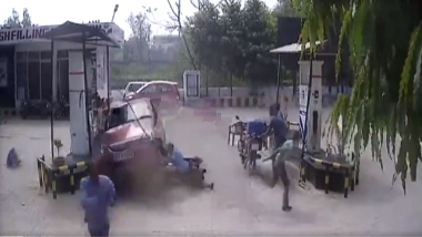 Watch Video: Man Learning to Drive, Rams Car Into Petrol Pump & Runs Over a Person in Kannauj 