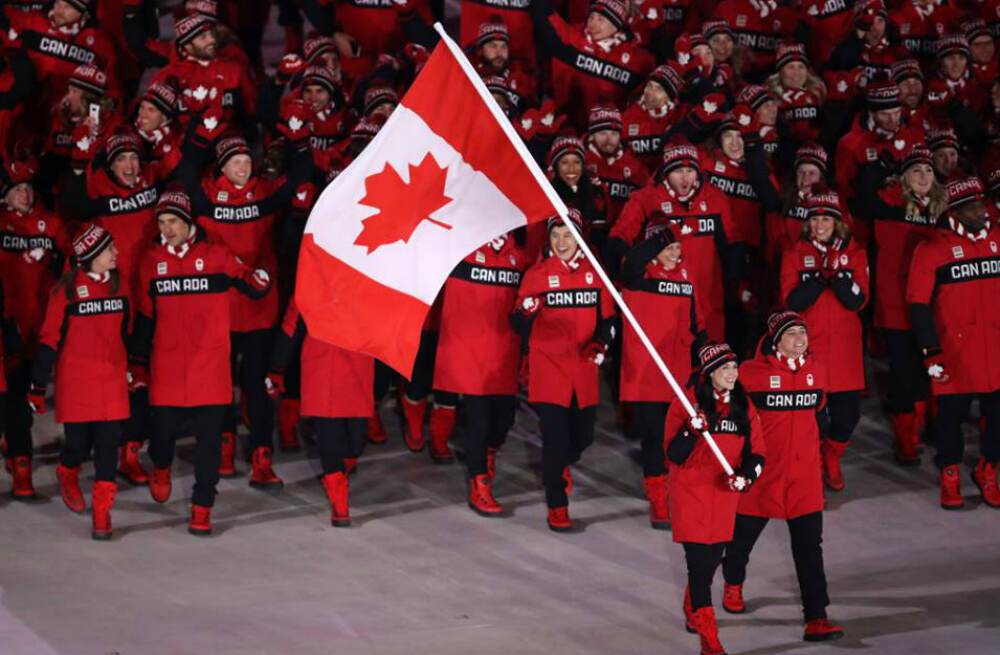 Ice dance stars Tessa Virtue and Scott Moir carried the Canadian flag at the opening ceremony Ice dance stars Tessa Virtue and Scott Moir carried the Canadian flag at the opening ceremony
