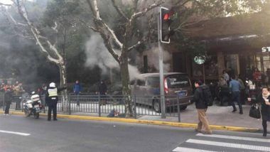 Accident Video From China: Driver Smoking in Van Carrying Gas Tanks Plows in Pedestrian on Busy Shopping Street