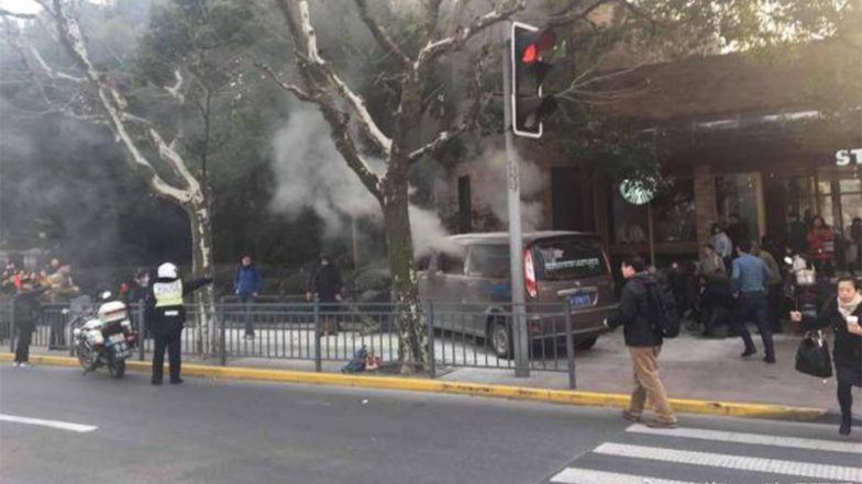Accident Video From China: Driver Smoking in Van Carrying Gas Tanks Plows in Pedestrian on Busy Shopping Street