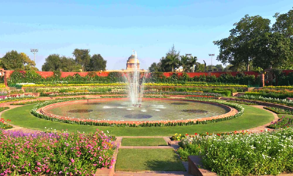 The waterfalls add to the beauty of the flowers around. The waterfalls add to the beauty of the flowers around.