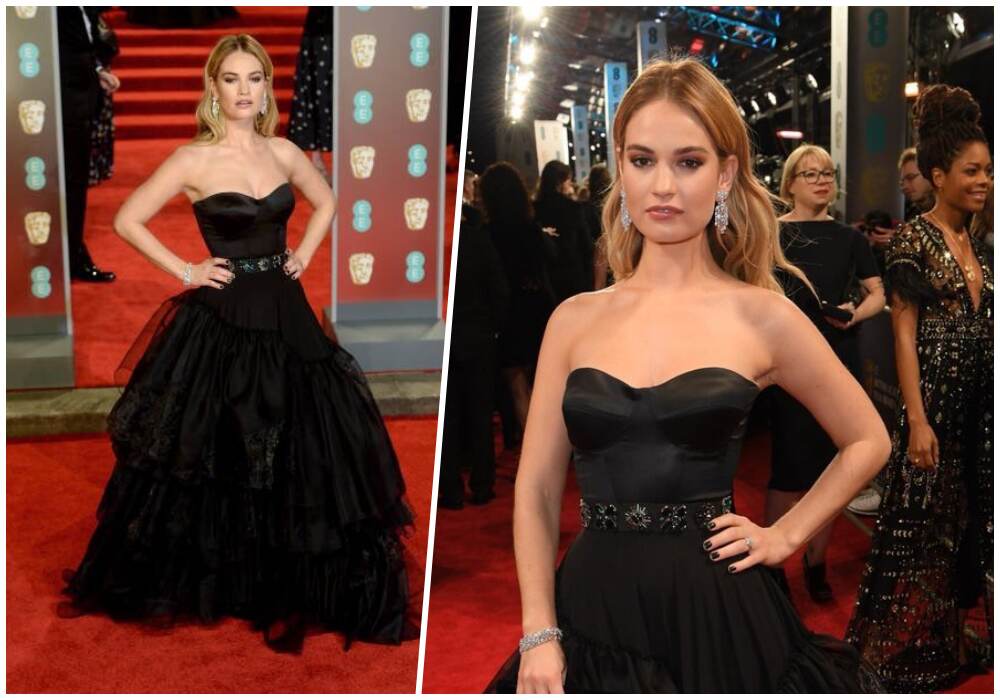 The 28-year-old blonde beauty stunned in a show-stopping necline ball gown as she arrives for BAFTAs. The 28-year-old blonde beauty stunned in a show-stopping necline ball gown as she arrives for BAFTAs.