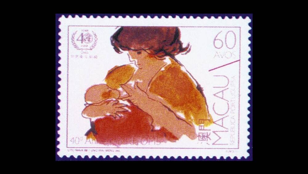 This postal stamp features a painting of a mother and infant. This postal stamp features a painting of a mother and infant.