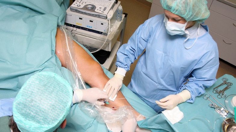 Doctor Conducts Leg Surgery on a Patient Brought in For Head Injury ...