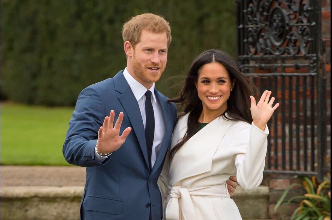 With Prince Harry clad in blue suit, and Markle in her pristine white dress, the couple display their royal standards.
With Prince Harry clad in blue suit, and Markle in her pristine white dress, the couple display their royal standards.