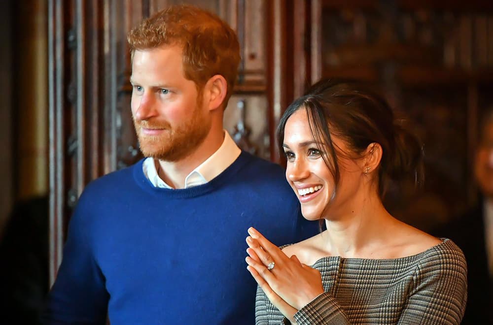 Meghan Markle and Prince Harry look happy to pose for the camera! Meghan Markle and Prince Harry look happy to pose for the camera!