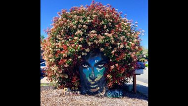 Prince Mural Blooms With Colorful Flowers in Shape of Late Singer's Hair