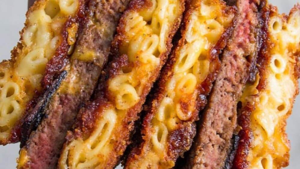 Delicious meat patties between mac and cheese Delicious meat patties between mac and cheese