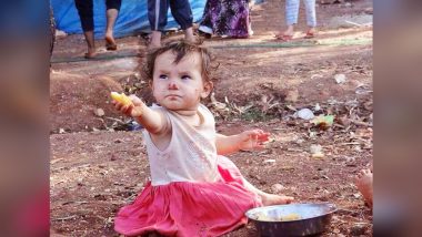 This Baby at Refugee Camp Offering Food to Journalist Will Restore Your Faith in Humanity in Times of War