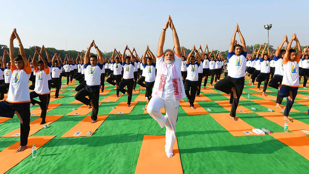 PM Narendra Modi Focuses the Spotlight on Yoga With Vrikshasana ...