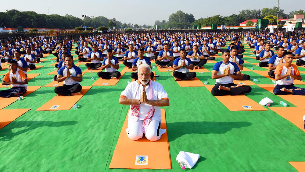 PM Narendra Modi Focuses the Spotlight on Yoga With Vrikshasana ...