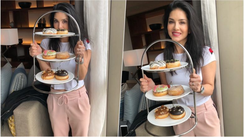 Sunny Leone Celebrates National Doughnut Day 2018 With Colourful Glazed Tasty Donuts (See Pic)