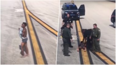 Almost Naked Teenager Runs & Climb the Wing of Airplane at Atlanta Airport, Nabbed by Police: Watch Video