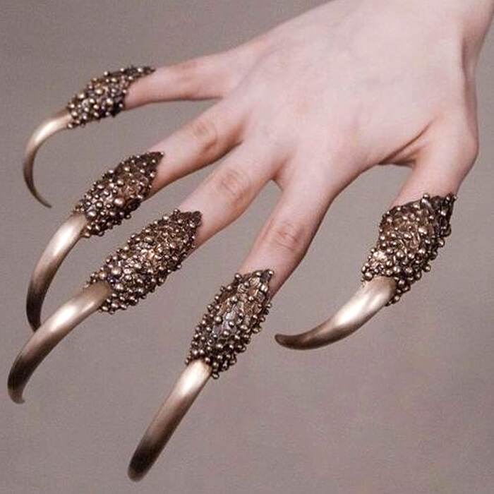Extra long nails are a popular nail trend. Extra long nails are a popular nail trend.