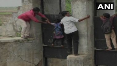Watch: Gujarat's Kheda Town Locals Risk Lives, Cross Canal Every Day Through Collapsed Bridge