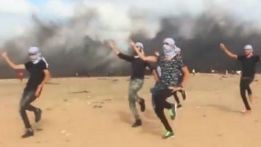 Palestinians Dancing to the Sound of Bullets and Rising Smoke in Background on Gaza Border Is Viral (Watch Video)