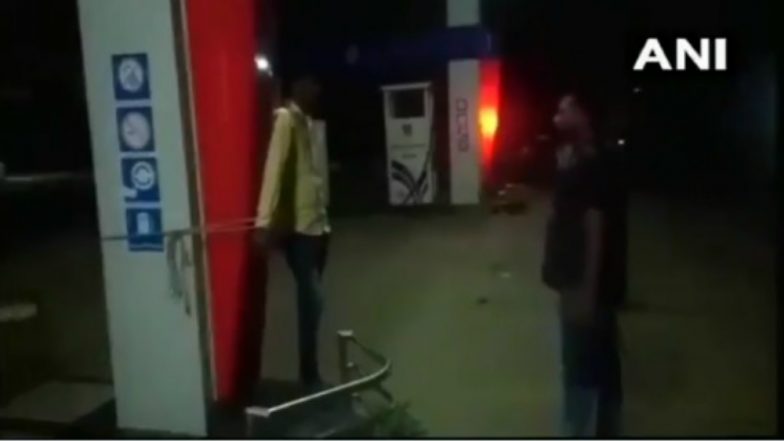 MP Shocker: Petrol Pump Owner Whips Employee for Being Absent (Watch Video)