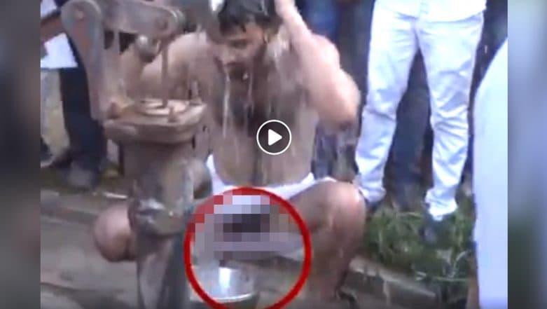 Tej Pratap Yadav Exposes a Little too 'Much' While Taking Bath at Handpump, Video Goes Viral Tej Pratap Yadav Exposes a Little too 'Much' While Taking Bath at Handpump, Video Goes Viral