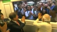 Watch Video: South Korean President Moon Jae-in and PM Narendra Modi Share a Hearty Conversation in Delhi Metro, Greet Commuters