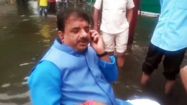 Watch Video: Bhopal Mayor Protests Against Floods, Sits in Middle of Water-Logged Street to Take Stock of Situation