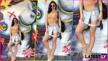Elli AvrRam Shows Us How to Wear a Dungaree as a Skirt, but It’s the Bare-Breasted Background Picture That’s Got Instagrammers’ Attention!