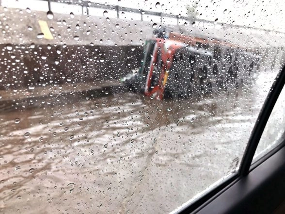 An overturned truck on a waterlogged road at Jalandhar bypass in Ludhiana (Image credit: LatestLY)