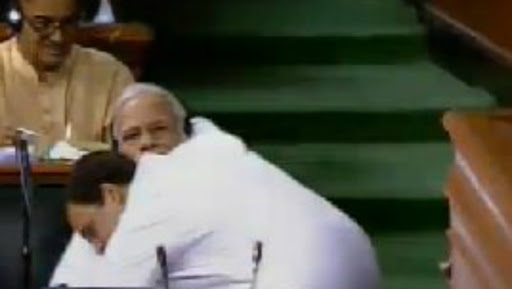 Rahul Gandhi Hugs Narendra Modi After Finishing His Speech on No Confidence Motion in Lok Sabha & then Winks: View Video & Pics