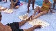 Toe-Wrestling Competition Held at Waterpark in China, Watch Funny Video!