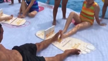 Toe-Wrestling Competition Held at Waterpark in China, Watch Funny Video!
