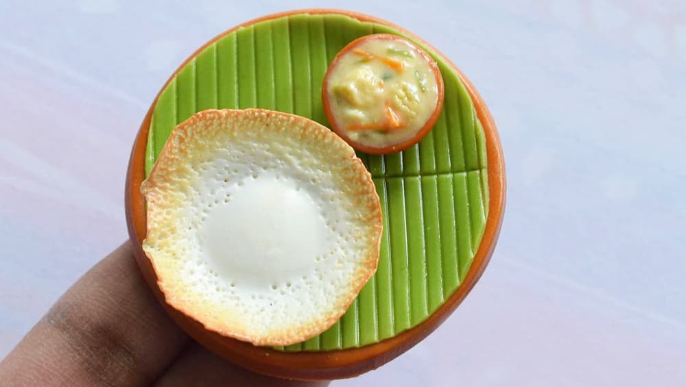 Frilly appams served with a vegetable stew Frilly appams served with a vegetable stew