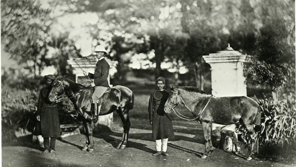 British man seated on a horse British man seated on a horse