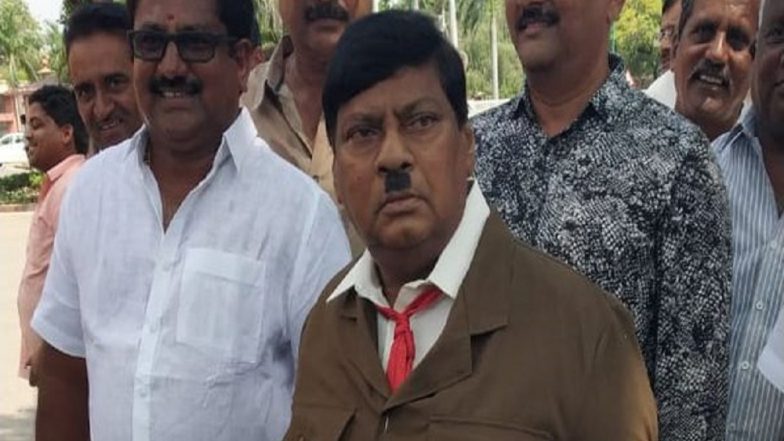 TDP MP Naramalli Sivaprasad Protests As Adolf Hitler In Parliament For Special Status To Andhra Pradesh: View Pic