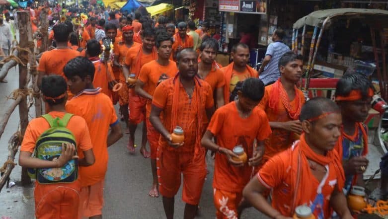 Uttar Pradesh CM Yogi Adityanath Ask Official to Shut Liquor Shops, Slaughterhouses on Kanwar Yatra Route Uttar Pradesh CM Yogi Adityanath Ask Official to Shut Liquor Shops, Slaughterhouses on Kanwar Yatra Route
