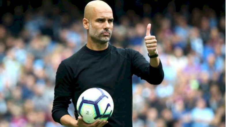 Manchester City Boss Pep Guardiola Receives RCB Jersey from Virat Kohli, Says ‘Time to Learn Cricket Rules’ (Watch Video)