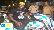 Chris Gayle Meets the Mumbai Police, Hugs the Officials (See Pics)