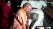 Chhattisgarh CM Raman Singh Touches Yogi Adityanath's Feet Before Filing Election Nomination: Watch Video