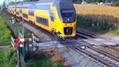 Dutch Cyclist Nearly Escapes Being Hit by Train, Video Will Make Your Heart Skip A Beat