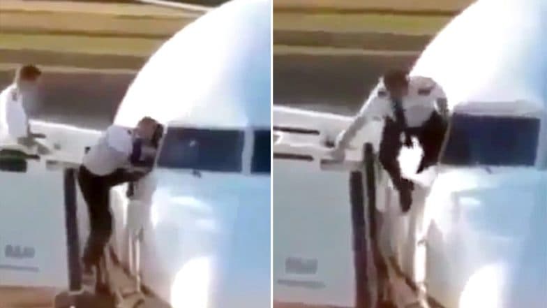 Pilot Enters Plane Through Cockpit Window, Old Video Goes Viral Leaving Internet Confused Pilot Enters Plane Through Cockpit Window, Old Video Goes Viral Leaving Internet Confused