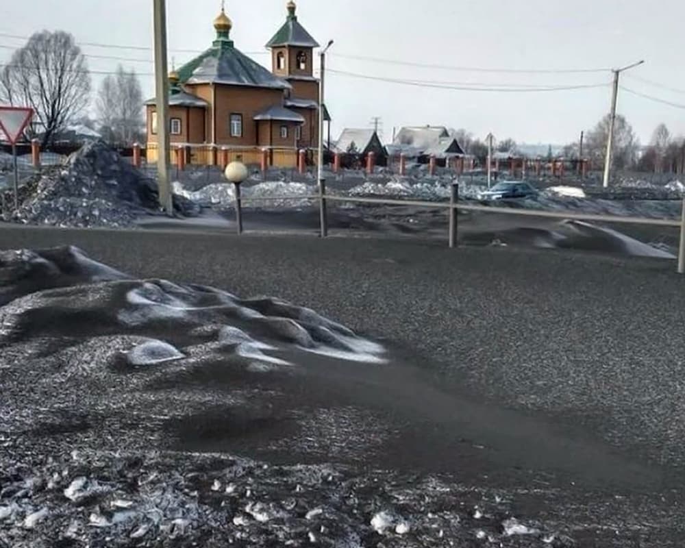 All the roads are covered in black snow. All the roads are covered in black snow.