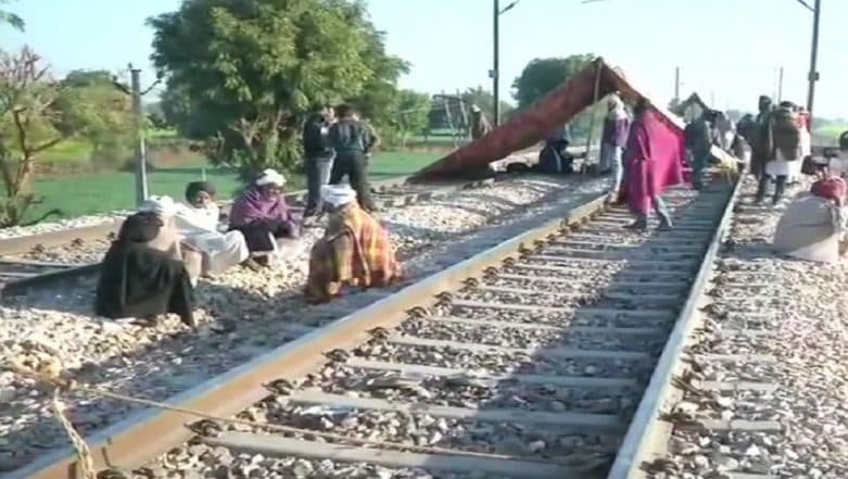 Gujjar Reservation Protest: 5 Trains Cancelled, 15 Diverted on Delhi-Mumbai Route: Two State Exams Also Postponed Gujjar Reservation Protest: 5 Trains Cancelled, 15 Diverted on Delhi-Mumbai Route: Two State Exams Also Postponed