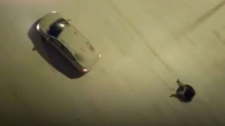 Father Lets Son Sit on Tyre Attached As Trolley to Car As He Drives in China; Booked for Violation of Traffic Laws (Watch Video)