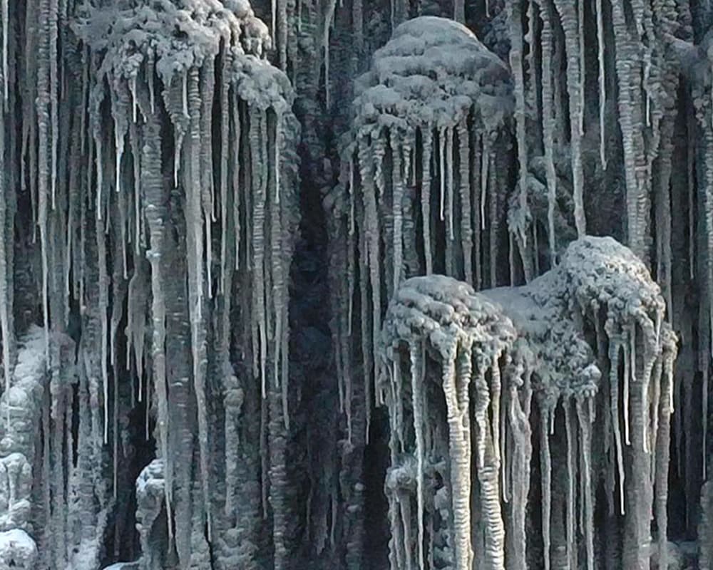 Frozen snow turned black due to settling coal dust. Frozen snow turned black due to settling coal dust.