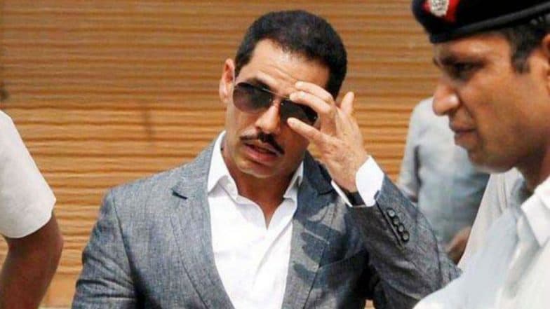 Robert Vadra Leaves ED Office After Seven Hours of Questioning on Day 2, Priyanka Gandhi Picks Him up After Interrogation Robert Vadra Leaves ED Office After Seven Hours of Questioning on Day 2, Priyanka Gandhi Picks Him up After Interrogation