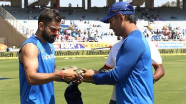 MS Dhoni Hands Specially Designed Army Caps  to the Players to Pay Tribute to Martyrs of Pulwama Attack Ahead of IND vs AUS 3rd ODI 2019 (Watch Video)