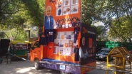 Namo Rath Selling T-Shirts, Pens, Badges and Masks Embellished With Modi&rsquo;s Messages, Pulls Crowd at Narendra Modi&rsquo;s Rally