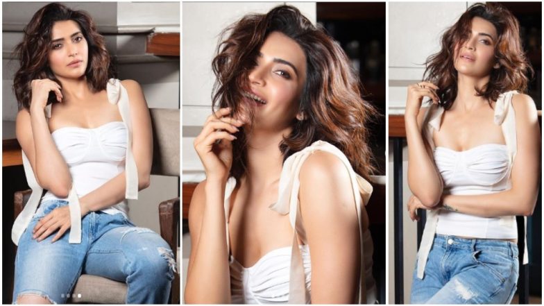 Naagin 3 Actress Karishma Tanna Pulls-Off Rugged Jeans and Plunging Neckline Top With Aplomb – View Pics