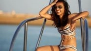 Radhika Apte Looks Happy and HOT as She Poses in a Black and White Striped Bikini- View Pics