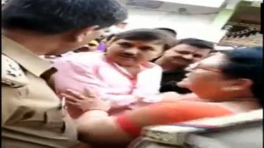 BJP Leader Suresh Awasthi Threatens Circle Officer During Phase 4 Polling For Lok Sabha Elections in Kanpur, Watch Video