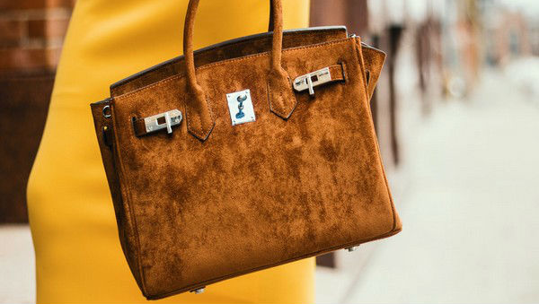Louis Vuitton Handbag Scheme Results in Woman's Arrest